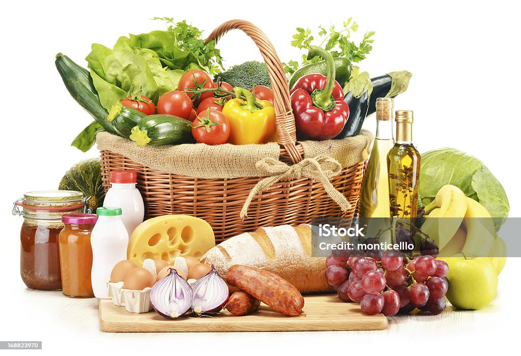 Composition with variety of grocery products isolated on white Basket Stock Photo