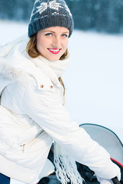 女性とスノーモービル風景 - women snowmobiling cute beautiful ストックフォトと画像
