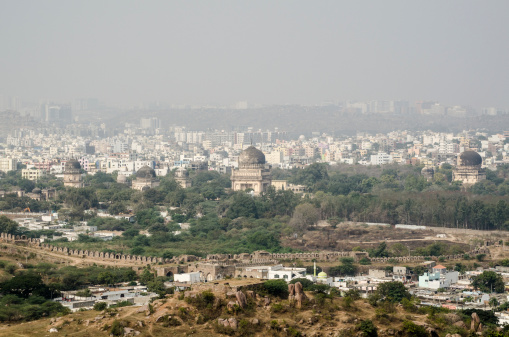 View from the top of Golkonda Fort looking towards the Islamic Qutb Shahi Tombs, known as Seven Tombs, in Hyderabad, India.