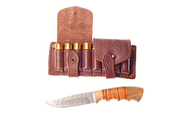istock Knife with ammunition for hunting 168827769
