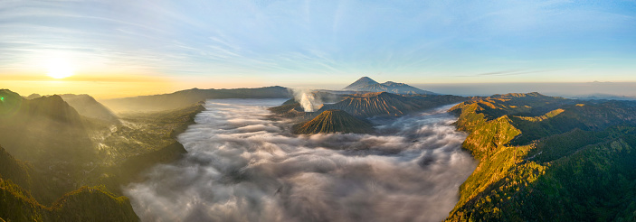 Aerial view panorama of Amazing Mount Bromo volcano during sunrise from king kong viewpoint on Mountain Penanjakan in Bromo Tengger Semeru National Park,East Java,Indonesia.Nature landscape background