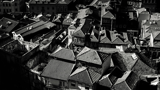 An aerial view of the houses in the old center of Porto, Portugal. Black and white photo.