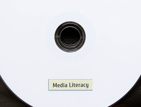 CD with label MEDIA LITERACY- concept of ability to understand and evaluate media messages, can make better choices to read, watch, and listen