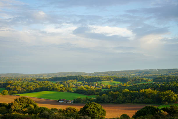 istock Looking at a sunset on countryside and farm fields 1688355554