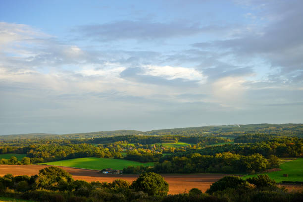 istock Looking at a sunset on countryside and farm fields 1688356628