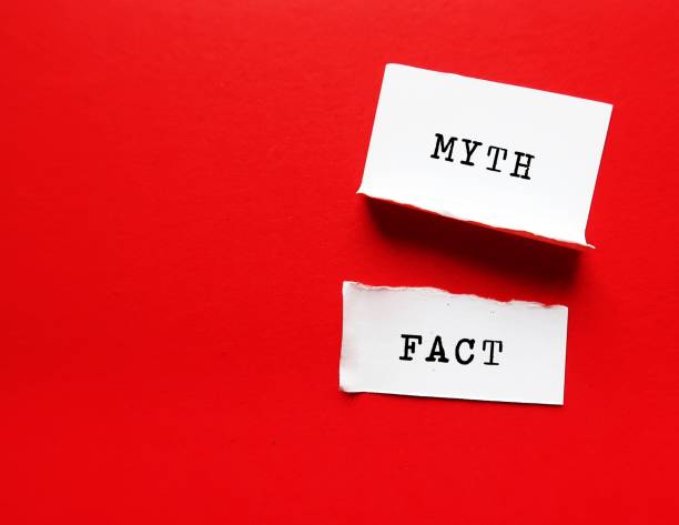 Torn paper on red copy space background with text written FACT and MYTH - Fact based on scientific evidence as proof - Myth from generational thoughts and beliefs