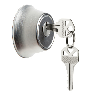 Metal key on white background with clipping paths.