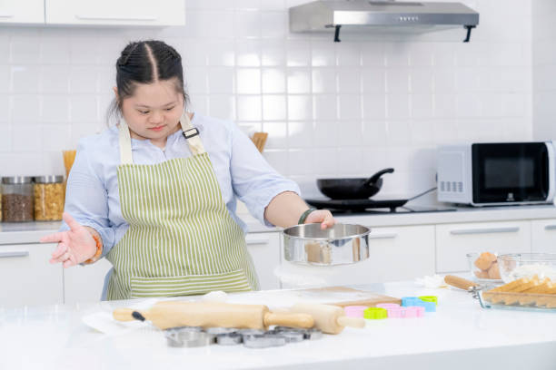 istock Young Asian girl doing bakery in kitchen 1688372004