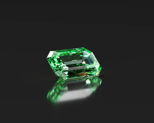 istock Green emerald isolated on glossy black background 3d rendering 1688372476