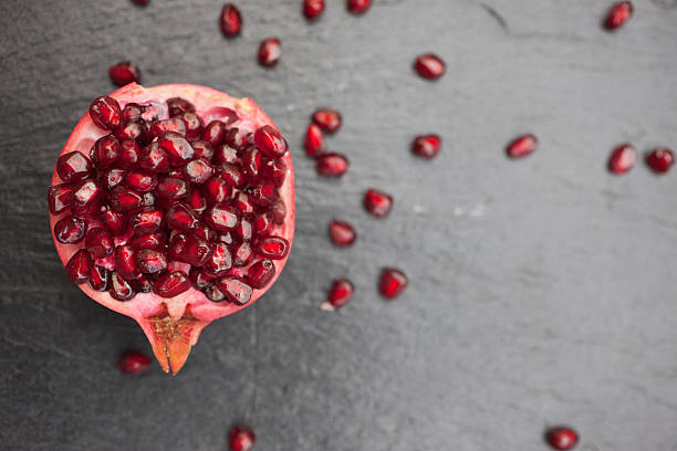 Pomegranate and seeds  pomegranate stock pictures, royalty-free photos & images