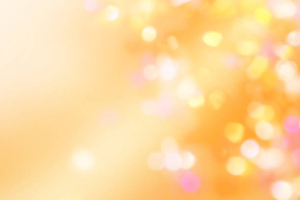 Abstract Golden Defocused Lights. Christmas Background.