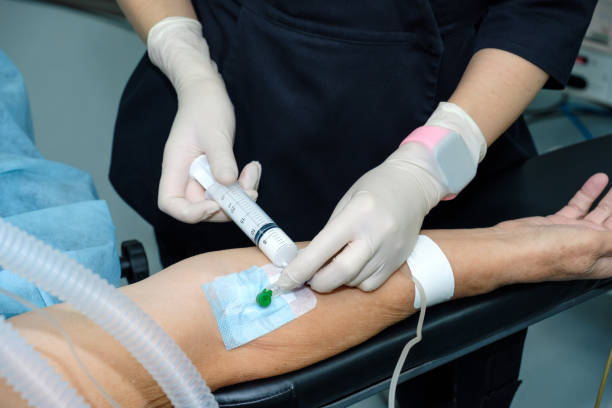 istock Injecting anesthesia through a catheter on the patient's arm. 1688411798