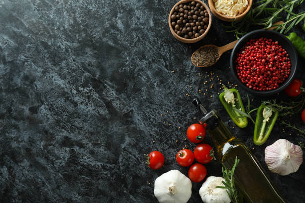istock Concept of aromatic spices on black smokey table 1688426776