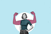 portrait of confident young happy woman looks in camera and shows muscle - natural female power business concept.