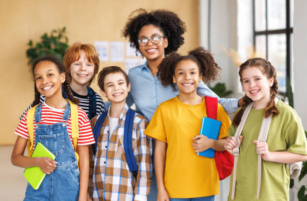 istock Portrait of teacher and students during lesson 1688460161