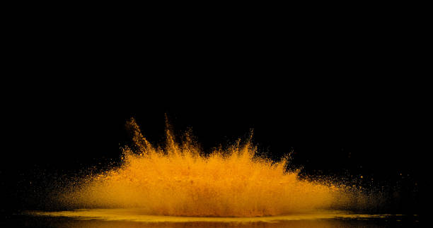 istock Turmeric, curcuma longa, Powder falling against Black Background, Indian Spice 1688463685