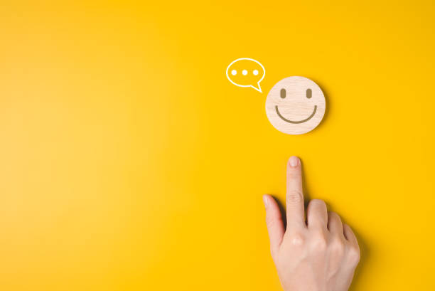 istock Hand with happy smile face emotion on background, Customer service evaluation, Positive thinking and mental health assessment, Happy client giving feedback with happiness 1688463859