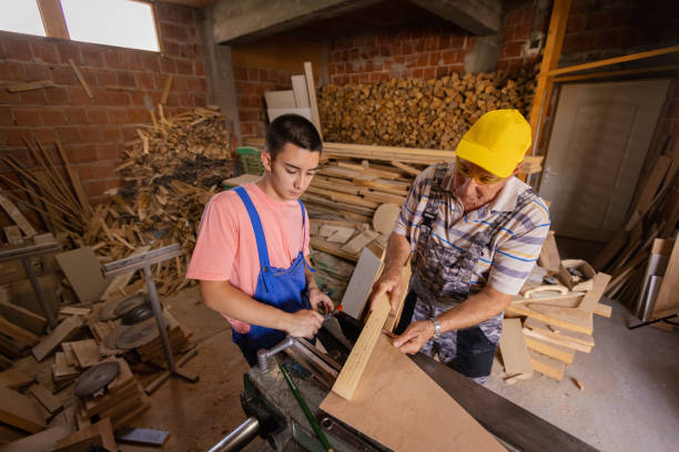 istock Grandfather and grandson in the workshop 1688472134