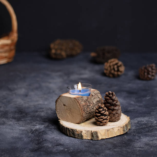 istock Wooden candle holders on gray floor 1688476152