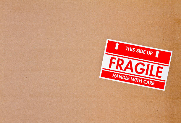 istock Fragile Sign on Cardboard Box 168848570