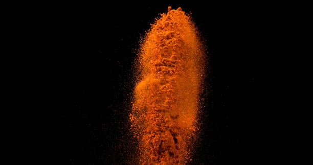 istock Paprika, capsicum annuum, Powder falling against Black Background 1688499112
