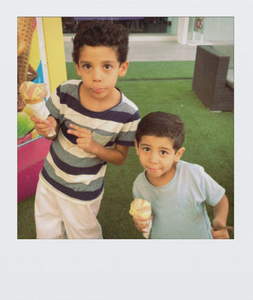 istock Brothers eating ice cream 1688506343