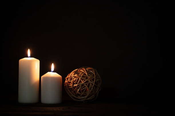 istock Burning candles and christmas decorations. 1688506575