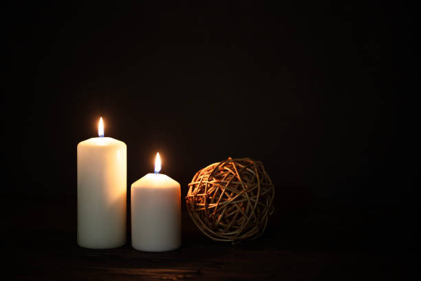 istock Burning candles and christmas decorations. 1688506670