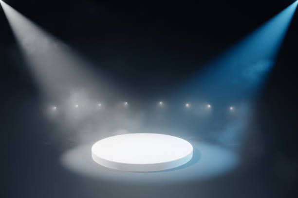 istock podium stage with lighting, podium stage scene with an award ceremony on blue background, 3D illustration rendering 1688518253