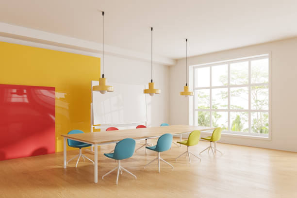 istock Bright office room interior with board and mock up presentation stand, window 1688518775