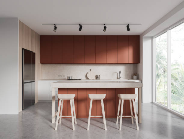 istock Cozy hotel kitchen interior with cooking and eating space, panoramic window 1688527511