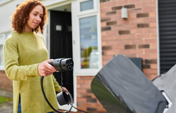 istock charging the electric car at home 1688537020