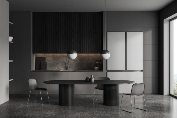 istock Dark home kitchen interior with eating and cooking space with panoramic window 1688542590