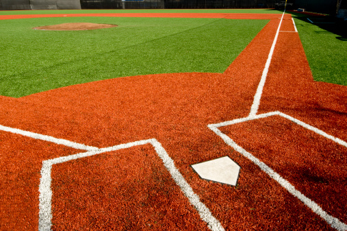 View from a drone, the location of the baseball field and the hardworking baseball team practicing in it is captured.