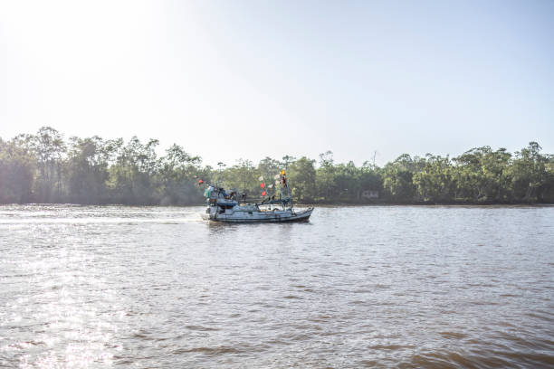 istock Fishing boat sailing on the Amazon river 1688559552