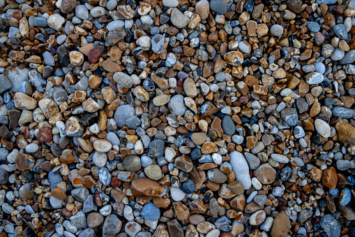 Colorful sea pebbles and rocks for natural background