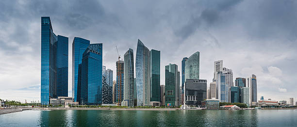 istock Downtown skyscrapers reflecting in Marina Bay Singapore 168856372