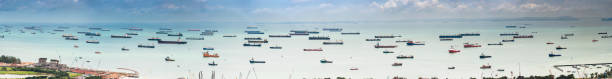 Container ships cargo freighter shipping moored in ocean harbour panorama