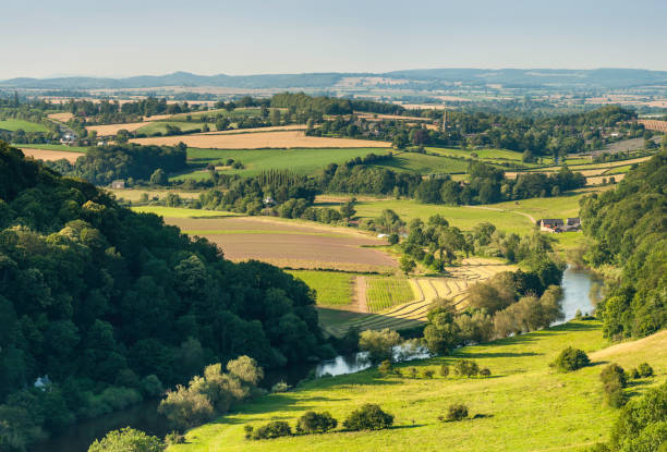 Idyllic river valley country villages summer fields