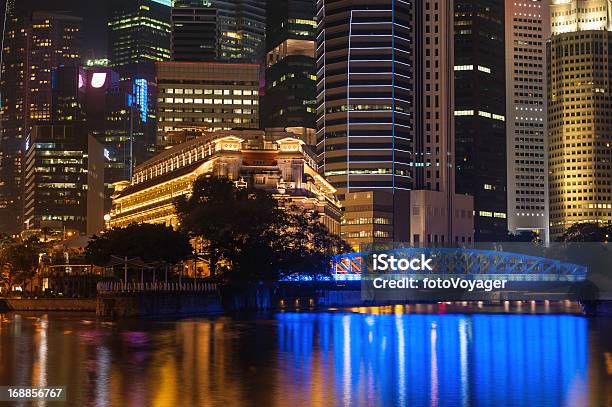 Singapore Crowded Skyscrapers Reflecting In River At Night Stock Photo - Download Image Now