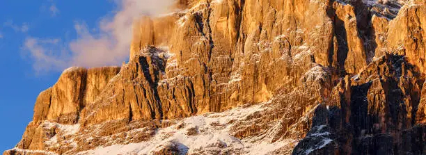 Photo of Sunset view on the Sorapiss Massif, from S. Vito di Cadore, Belluno district, Veneto, Italy, Europe. Range with characteristic peaks, wooded areas and lakes, a popular place for hiking and cycling.