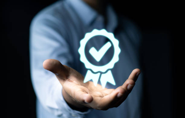 istock Quality Assurance Concept. Businessman touching check icon on virtual screen.  Business process automation, certification, service guarantee, Validation concept. 1688577830