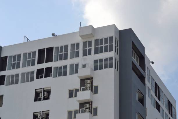 istock White building with air conditioners and windows 1688579968