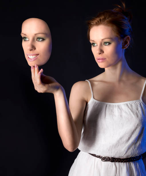 istock Woman Behind the Smiling Mask 168859628