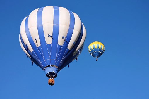 A hot air balloon drifting in the sky.