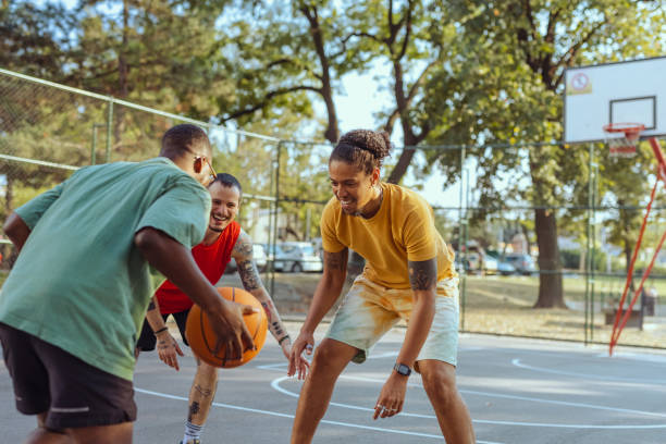 istock Young men playing basketball 1688613481