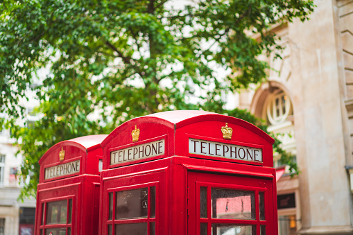 Telephone booths.  Fruit for sale.