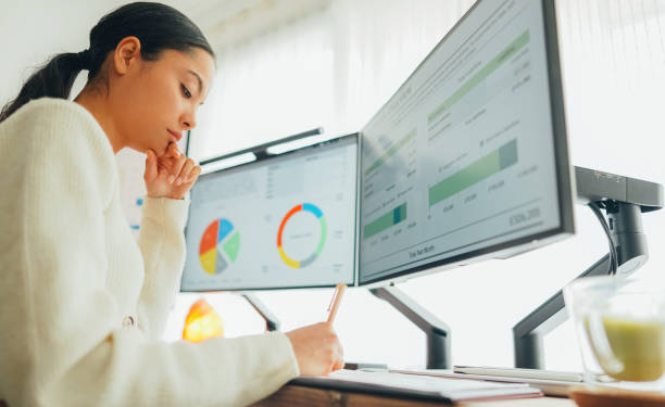 istock Woman with back pain working at standing desk home office 1688654539