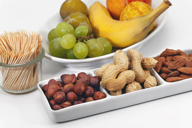 Fresh fruits and dried fruits and toothpicks