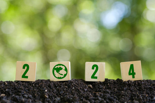 istock Ideas for ESG Investment Sustainable Organization Development consider the environment. ESG concept of environment, society and governance. ESG icons on wooden blocks with stacks of coins. 2024 esg 1688678716